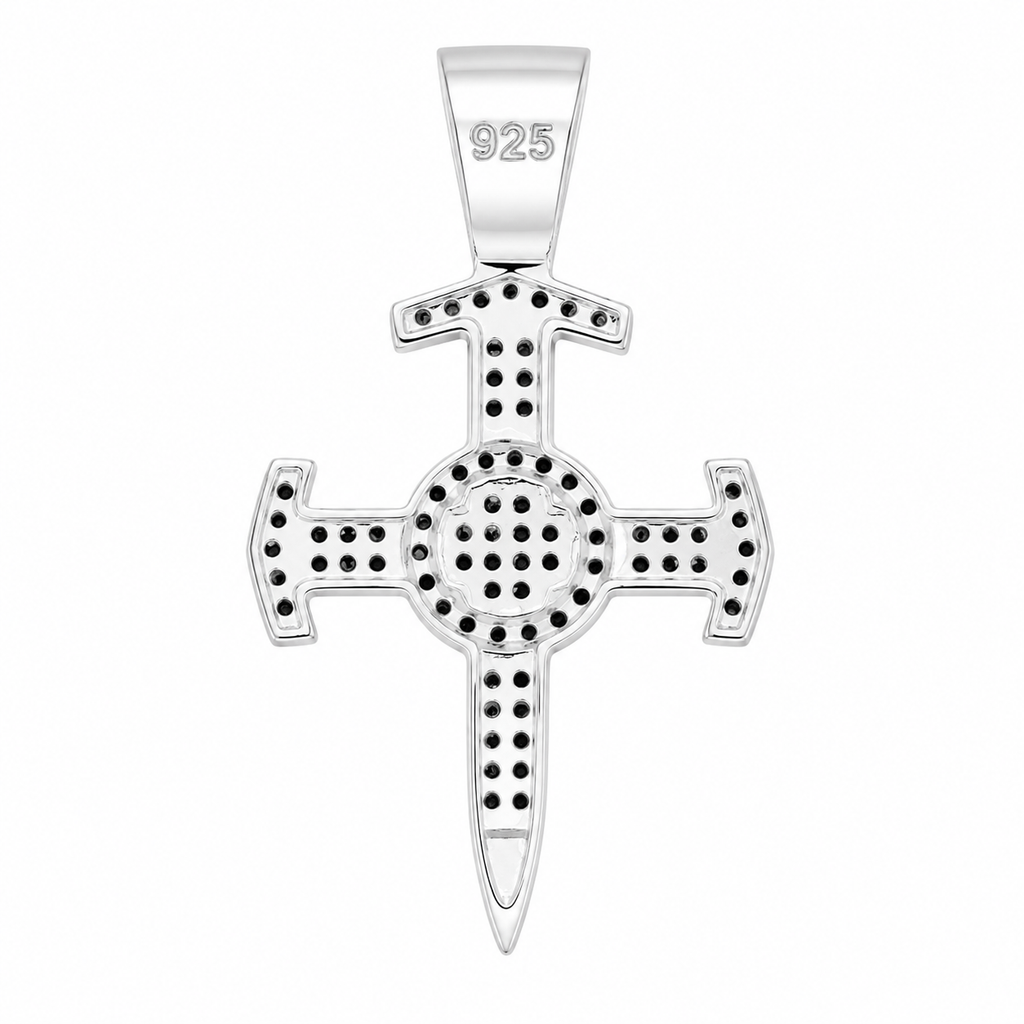 Reverso de dije cruz sagrado corazón plata 925, sello 925 visible en argolla